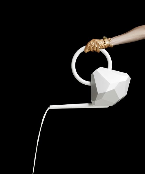 Crystal watering can with golden gloves